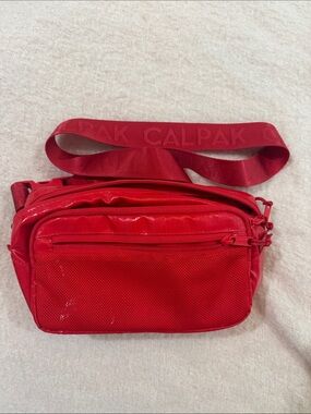Calpak Bright Red Crossbody Belt Bag